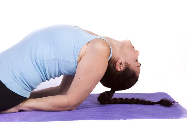 Frau in Yoga-Stellung — Stockfoto