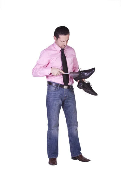 Przypadkowy mężczyzna wybierając buty — Zdjęcie stockowe