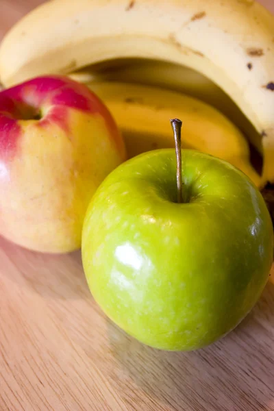 Jablka a banány Stock Fotografie