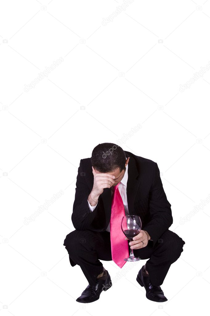 Crouched Mediterranean Man Drinking