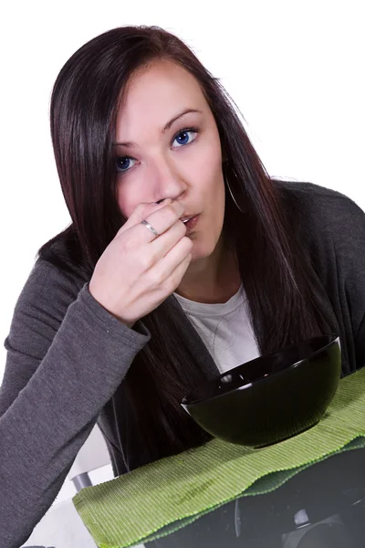 Krásná dívka jíst cereálie — Stock fotografie
