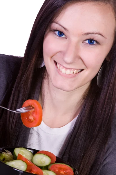 Menina bonita comer salada — Fotografia de Stock