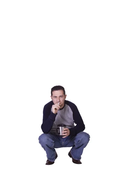 Crouched Mediterranean Man Smoking — Stock Photo, Image