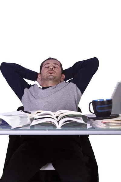 College student slapen op zijn Bureau — Stockfoto