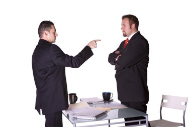 Businessmen Fighting Across the Desk clipart