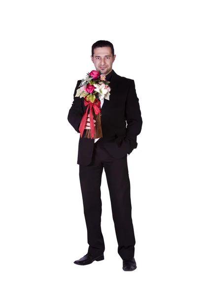 Επιχειρηματίας κρατώντας λουλούδια στο χέρι — Φωτογραφία Αρχείου