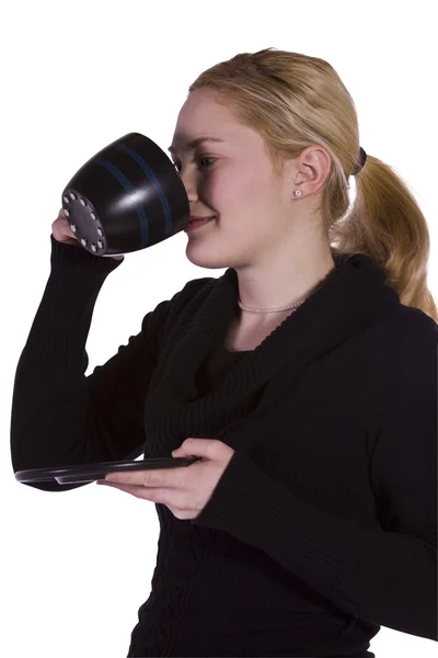 Žena pití kávy stojí — Stock fotografie
