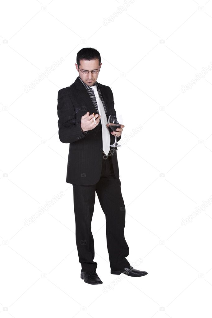 Businessman celebrating with a glass