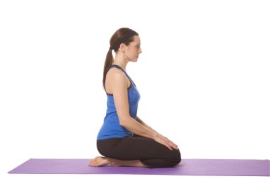 Yoga pozisyonunda bir kadın