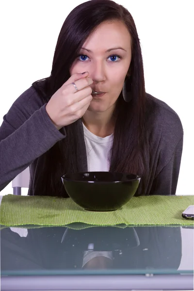 Krásná dívka jíst cereálie — Stock fotografie