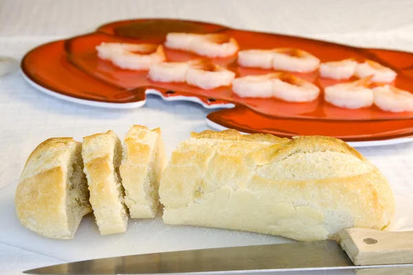 Chiuda su pane a fette su un tavolo — Foto Stock