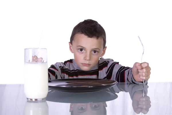 Liten pojke väntar middag — Stockfoto