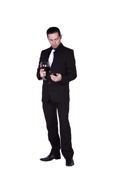 Empresário com um copo de bebida — Fotografia de Stock