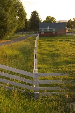 Countryside Fence Leading to A Ranch clipart