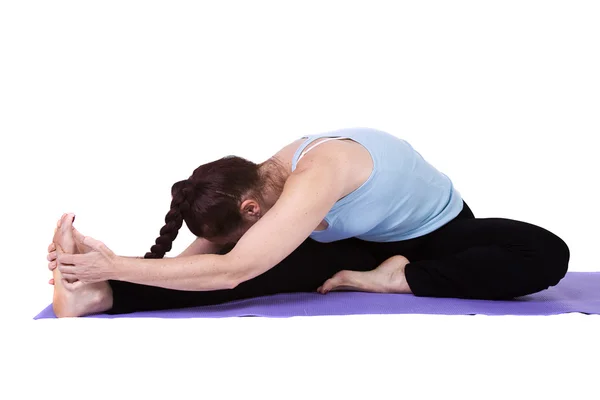 Kobieta w pozycji do jogi — Zdjęcie stockowe
