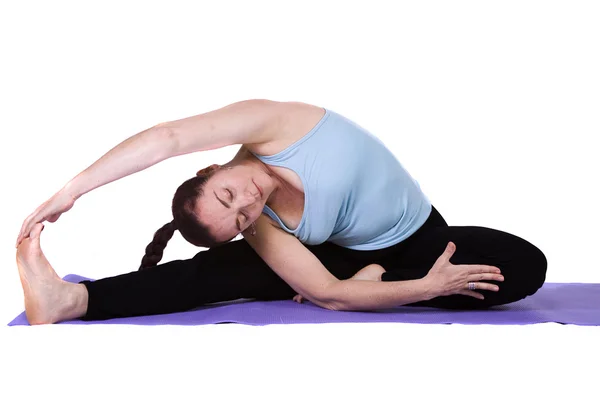 Vrouw in yoga positie — Stockfoto