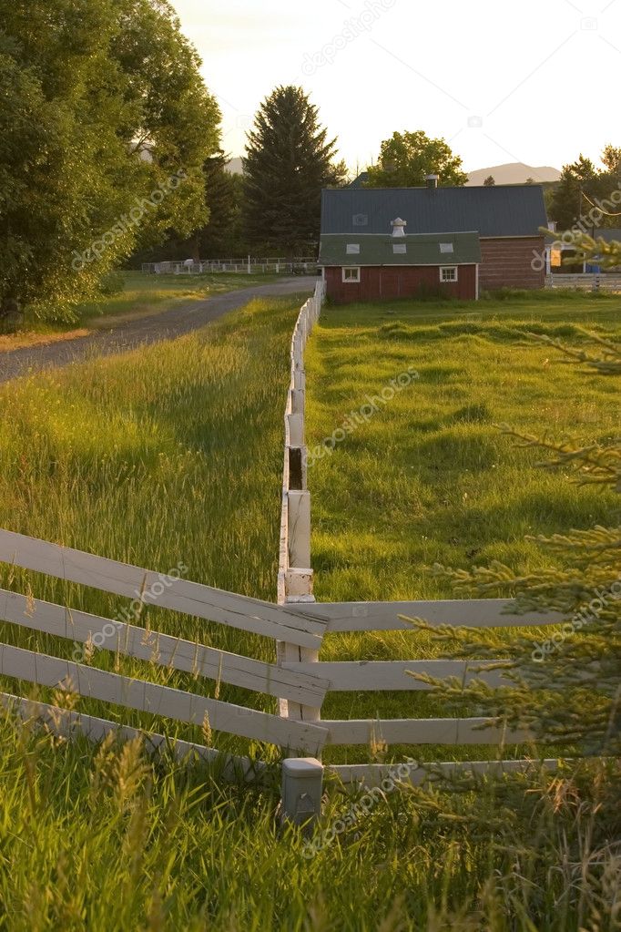 Countryside Fence Leading to A Ranch