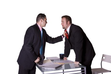 Businessmen Fighting Across the Desk clipart