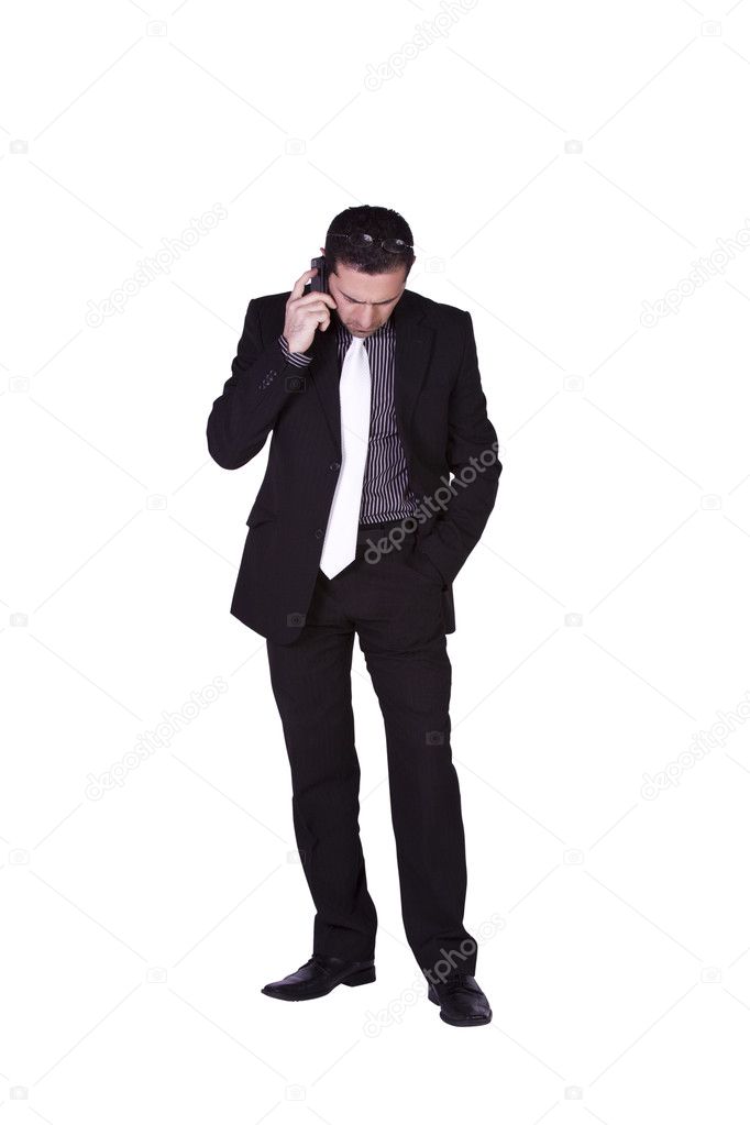 Businessman looking down while talking