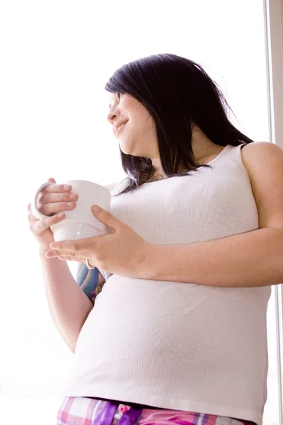 Stock image Woman by the Window with a Cup