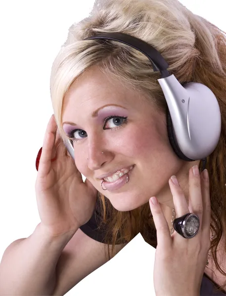 Милая девушка слушает музыку — стоковое фото