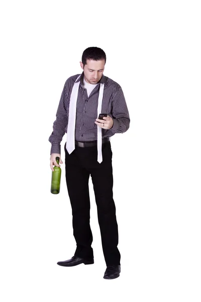 Affärsman med en flaska dryck — Stockfoto