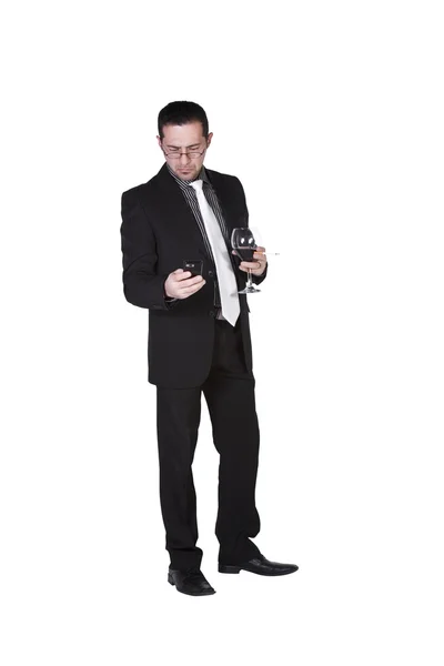 Несчастный бизнесмен со стаканом напитка и сигаретой — стоковое фото