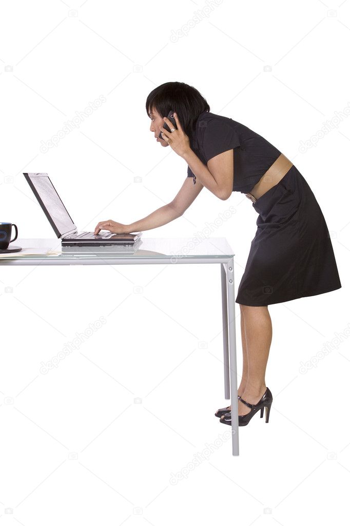 Businesswoman at Her Desk Working