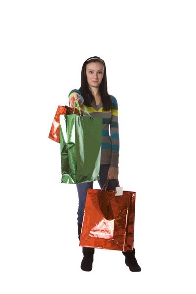 Tiro isolado de uma menina bonita com sacos de compras — Fotografia de Stock