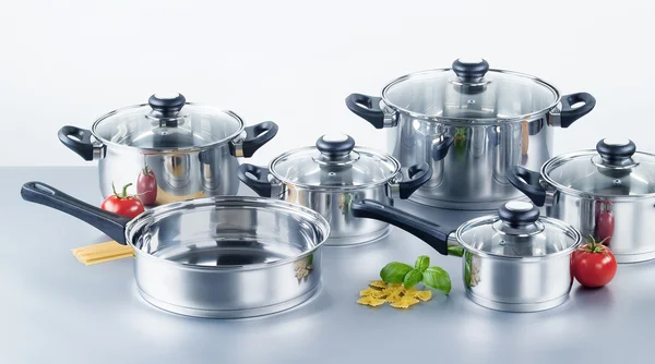 Stainless steel pots and pans — Stock Photo, Image