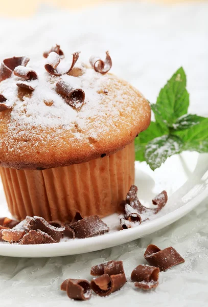 Muffin topped with chocolate shavings — Stock Photo, Image