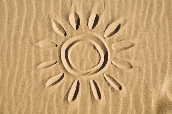 Sun drawn in the sand — Stock Photo, Image