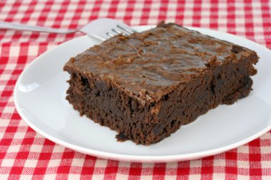 Fudge brownie on white plate clipart