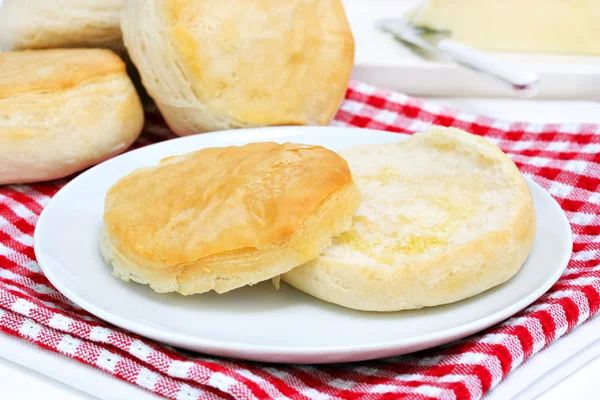 Fresh biscuit with melted butter — Stock Photo, Image