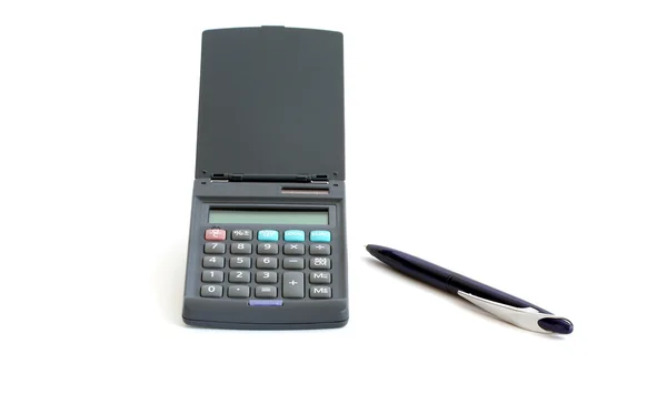 Calculadora com uma caneta esferográfica — Fotografia de Stock