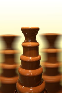 Chocolate Fountain - a set of stages which flows chocolate clipart