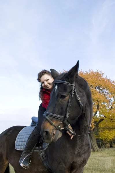 Dva úsměvy. equestrienne a koně. — Stock fotografie
