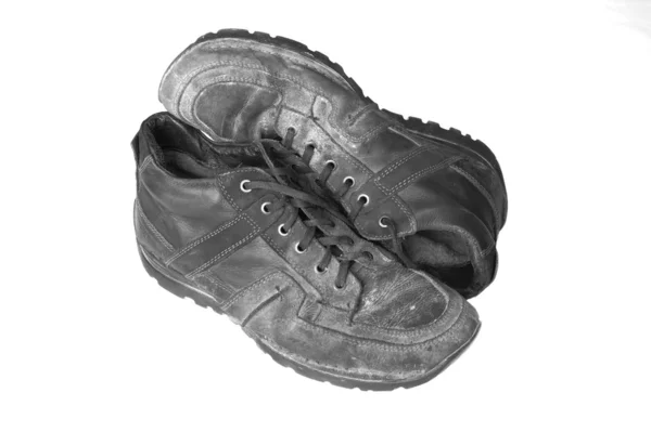 Muddy boots in the construction dust — Stock Photo, Image