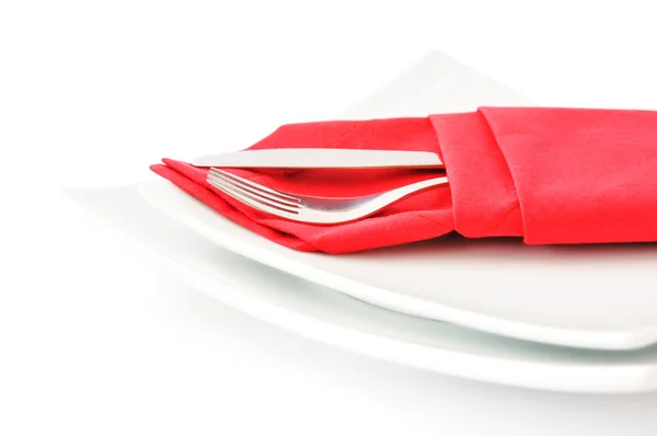 Coltello e forchetta in un tovagliolo rosso — Foto Stock