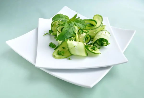 Cucumber salad with greens and sesame — Stock Photo, Image