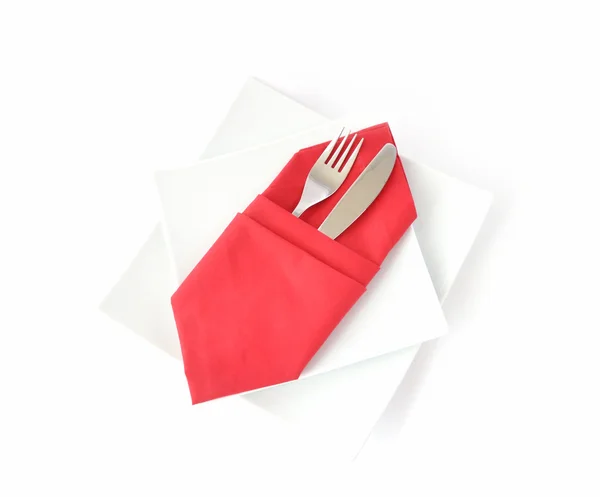 Knife and fork in a red napkin — Stock Photo, Image