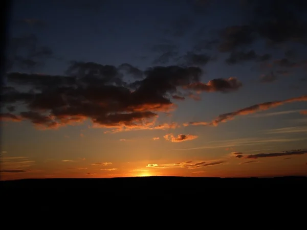 Закат солнца Стоковое Изображение