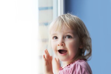 Girl by window clipart