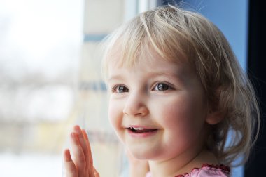 Girl by window clipart