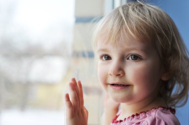 Girl by window clipart