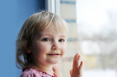 Girl by window clipart