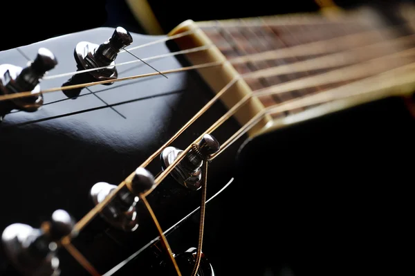 Neck of black guitar — Stock Photo, Image