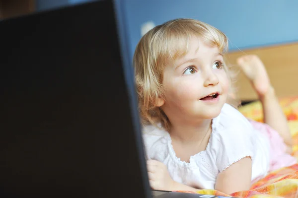 Little girl with laptop — Stock Photo, Image