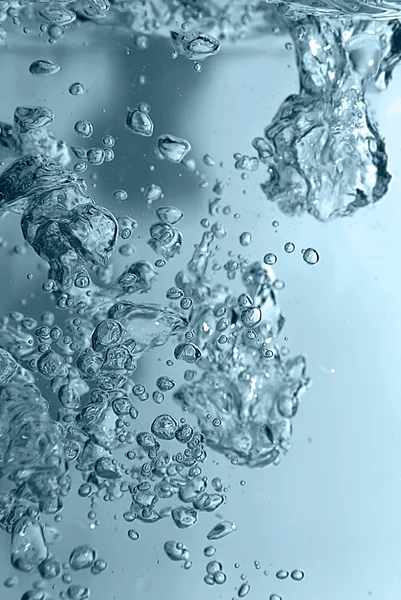 Bubliny ve vodě zblízka — Stock fotografie