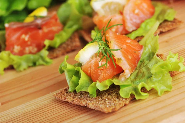 Salmon and small loafs — Stock Photo, Image